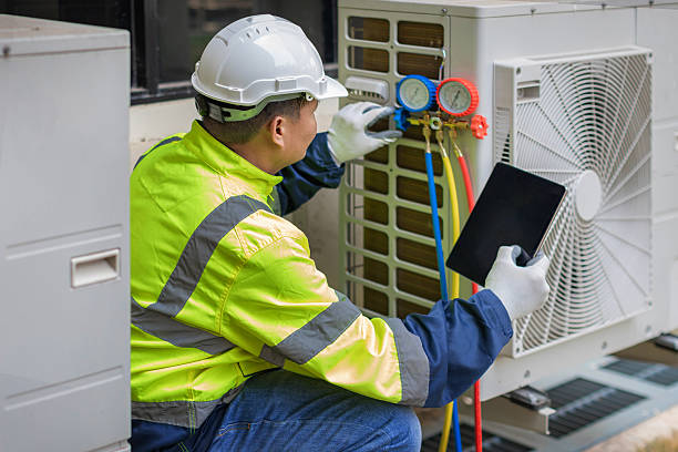 Professional Hvac technician working in Harrah, WA